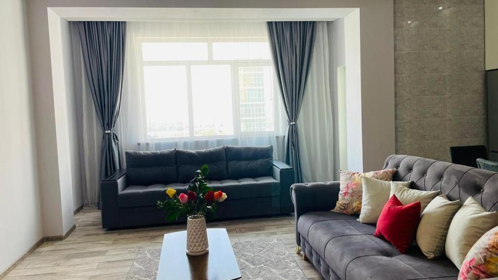 Apartment просторные апараменты в центре, жк оркендеу Almaty